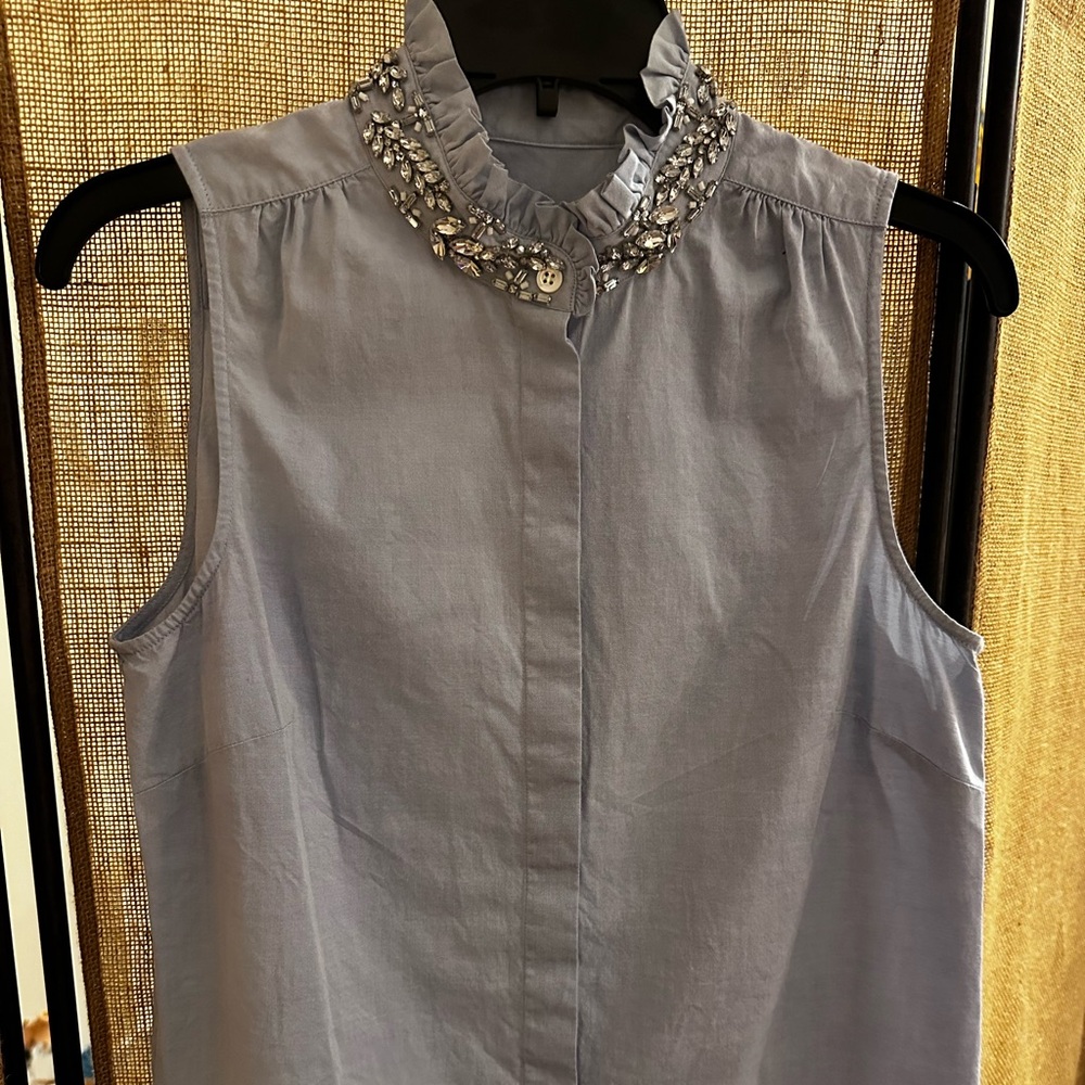 J Crew Blue Sleeveless oxford with jeweled neckline. Also ruffle detail at top.